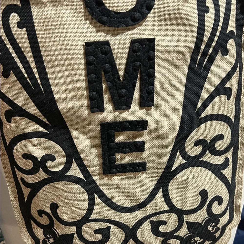 Black and Tan Welcome Sign